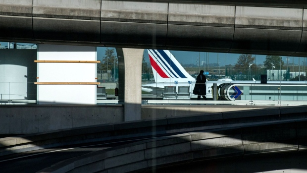 The tail fin of an Air France-KLM passenger jet at Paris-Charles de Gaulle airport in Paris, France, on Monday, Nov. 8, 2021. The U.S. is lifting entry restrictions for more than 30 countries, allowing fully vaccinated travelers to fly from places including Europe, China and India.