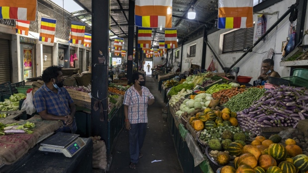 A vegetable market in Colombo, Sri Lanka, on Monday, May 16, 2022. Sri Lanka has been rattled by power cuts, food shortages, and a currency in free fall, which fueled protests and pushed Prime Minister Mahinda Rajapaksa to resign.