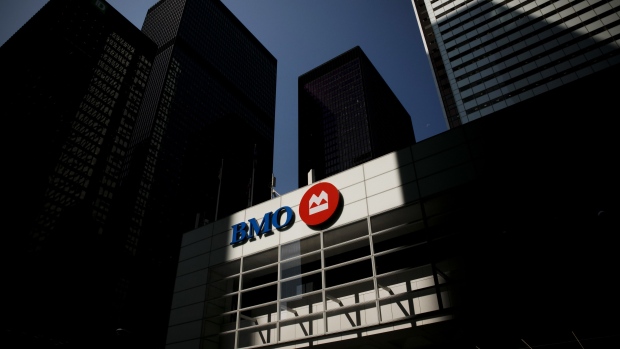 Bank of Montreal (BMO) signage is displayed on a building in the financial district of Toronto, Ontario, Canada, on Thursday, July 25, 2019. Canadian stocks fell as tech heavyweight Shopify Inc. weighed on the benchmark and investors continued to flee pot companies.