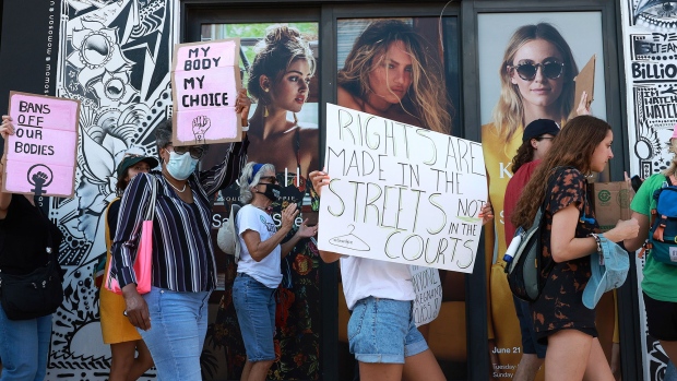 People march together to protest the Supreme Court's decision in the Dobbs v Jackson Women's Health case in Miami on June 24. 