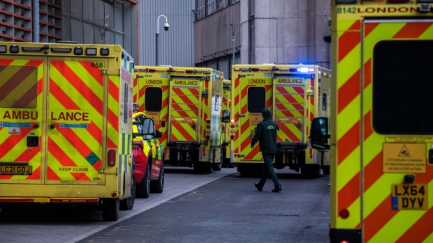 Ambulances queued up outside the Royal London Hospital in London, U.K., on Friday, Jan. 7, 2022. The U.K. sent 200 armed forces personnel into hospitals in London to help relieve staff shortages due to a surge in the omicron Covid-19 variant. Photographer: Chris J. Ratcliffe/Bloomberg