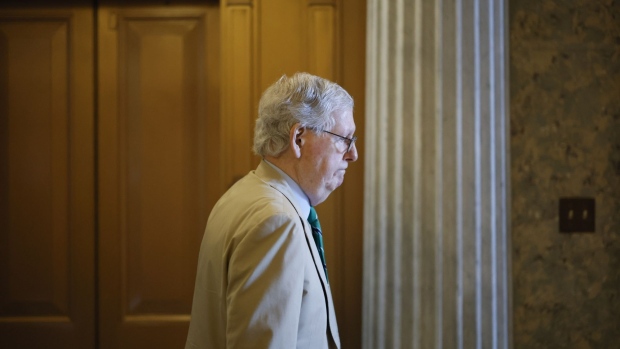 Senate Minority Leader Mitch McConnell, a Republican from Kentucky, walks through the US Capitol in Washington, D.C., US, on Thursday, May 26, 2022. Democratic and Republican senators grasping for some common ground on gun laws and school safety after the massacre of 19 students and two teachers in Texas are working under a short timetable, and prospects are dim for an expansive agreement.
