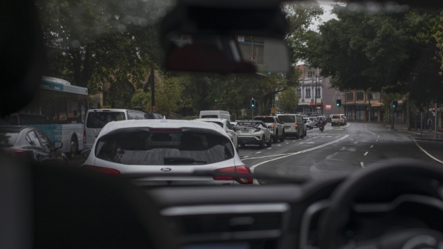 Vehicles sit in traffic in Sydney, Australia, on Monday, Feb. 28, 2022. Australia is scheduled to release gross domestic product (GDP) figures on March 2. Photographer: Brent Lewin/Bloomberg