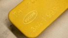 An engraving of 99.99 identifies the purity displayed on a 12.5 kilogram gold ingot at the Prioksky non-ferrous metals plant in Kasimov, Russia, on Thursday, Dec. 9, 2021. Bullion is heading for its first annual drop in three years as central banks start to dial back on pandemic-era stimulus.