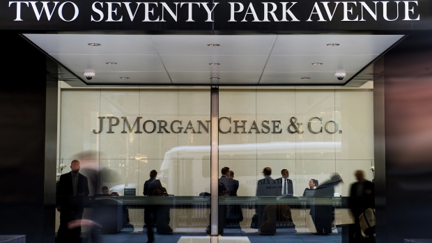 Signage is displayed outside a JPMorgan Chase & Co. office building in New York, U.S., on Wednesday, April 11, 2018. JPMorgan Chase & Co. is scheduled to release earnings figures on April 13. Photographer: Bloomberg/Bloomberg