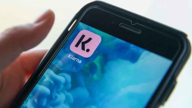 A Klarna app icon on a mobile phone arranged in London, U.K., on Thursday, Jan. 21, 2021. Klarna AB, a Swedish payment provider for online shoppers, is still setting its sights on an initial public offering even after its latest funding round left it roughly twice as valuable as it was a year ago.