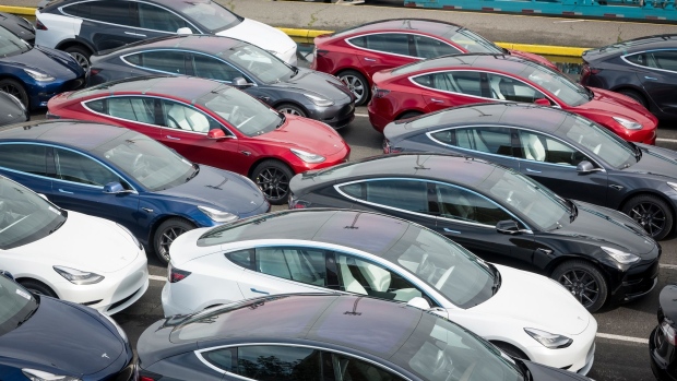 Tesla Inc. vehicles sit in a parking lot before being shipped from the Port of San Francisco in San Francisco, California, U.S., on Thursday, Feb. 7, 2019. Tesla is loading as many Model 3 sedans as it can onto vessels destined for China ahead of March 1, when a trade-war truce between presidents Donald Trump and Xi Jinping is scheduled to expire.