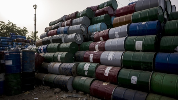 Oil barrels in Faridabad, India, on Sunday, June 12, 2022. Extreme weather conditions in some nations, combined with Russia’s invasion of Ukraine, have led to a global squeeze in supplies of fossil fuels, and sent prices of oil, natural gas and coal soaring. Photographer: Anindito Mukherjee/Bloomberg