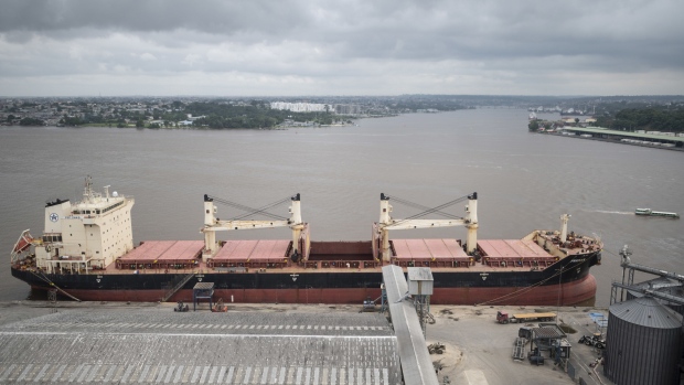 A container ship after unloading wheat in Abidjan, Ivory Coast, on June 29. Photographer: Andrew Caballero-Reynolds/Bloomberg