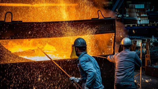 KREFELD, GERMANY - APRIL 21: Workers prepare to pour ductile iron casting molten iron into a mould at the Siempelkamp Giesserei foundry on April 21, 2022 in Krefeld, Germany. The Siempelkamp foundry is one of many companies in Germany's manufacturing sector that would be acutely affected by a halt of Russian energy imports, especially natural gas. The company, which makes parts including for applications in the renewable energies sector, is one of the few in Europe that can cast pieces up to 300 tons. A company spokesman said that a disruption to Germany's natural gas supply would bring much of the foundry's manufacturing ability to a halt. In addition Siempelkamp is already facing multifold price increases for its raw materials, including scrap iron, nickel, aluminum and other metals, due to the current EU sanctions against Russia. The German government is currently wrestling with how it can reduce Germany's heavy dependence on Russian energy imports in the wake of Russia's military invasion of Ukraine. (Photo by Sascha Schuermann/Getty Images) Photographer: Sascha Schuermann/Getty Images Europe