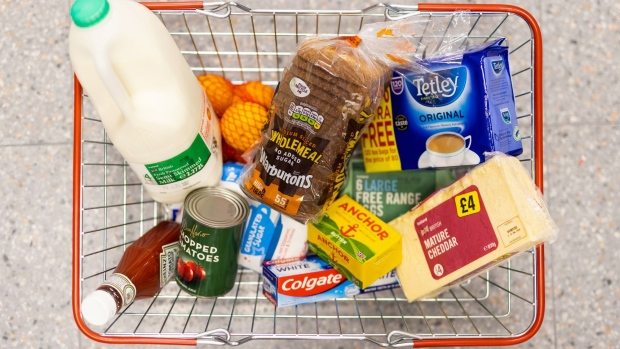 A basket of staple food items at an Iceland Foods Ltd. supermarket in Christchurch, UK, on Wednesday, June 15, 2022. "Britain's cost-of-living crisis -- on track to big the biggest squeeze since the mid-70s -- will continue to worsen before it starts to ease at some point next year," said Jack Leslie, senior economist at the Resolution Foundation, a research group campaigning against poverty.