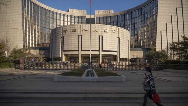 The People's Bank of China (PBOC) in Beijing, China, on Monday, Dec. 13, 2021. Economists predict China will start adding fiscal stimulus in early 2022 after the country’s top officials said their key goals for the coming year include counteracting growth pressures and stabilizing the economy. Photographer: Andrea Verdelli/Bloomberg