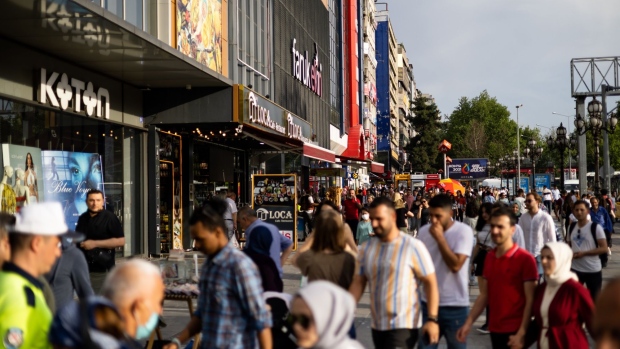 Pedestrians in a shopping zone in the Kizilay district of Ankara, Turkey, on Tuesday, May 31, 2022. Turkey’s inflation soared in May to the fastest since 1998 as it came under more pressure from the rising cost of food and energy while ultra-loose monetary policy contributed to currency weakness.
