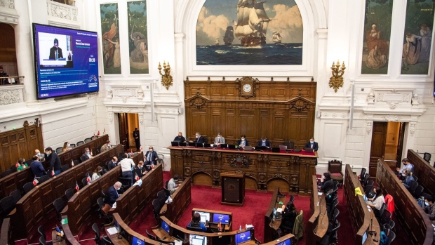Lawmakers attend a meeting of the Constitutional Convention at the former Chilean National Congress in Santiago, Chile, on Monday, April 11, 2022. Thirty-eight percent of voters would reject the new constitution in the referendum, marking an increase of 7 percentage points, according to a Data Influye poll.
