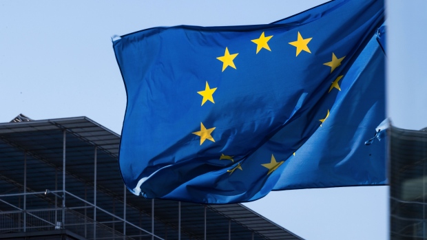 A European Union (EU) flag flies near the Europa building in Brussels, Belgium, on Tuesday, Feb. 9, 2021. Ukraine is working to introduce more transparent regulation in the natural gas industry, where it also wants to strengthen links with the European Union. Photographer: Geert Vanden Wijngaert/Bloomberg