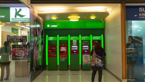 Ground markings for social distancing are displayed at Kasikornbank Pcl automated teller machines (ATM) in the Central World Mall during a partial lockdown imposed due to the coronavirus in Bangkok, Thailand, on Monday, May 11, 2020. Thailand’s next stage of reopening the country would allow large businesses to resume operations if there’s no surge in new infections found, according to Taweesilp Witsanuyotin, a spokesman for the Covid-19 center on May 7. Photographer: Andre Malerba/Bloomberg