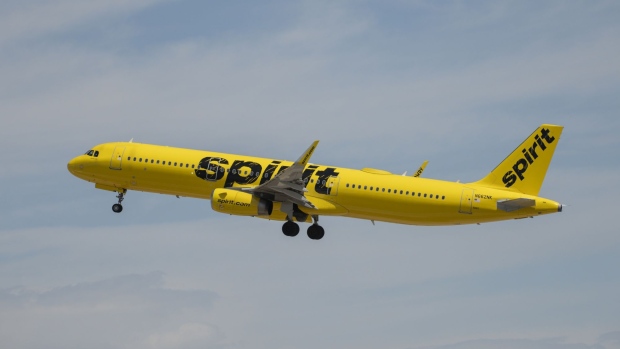 A Spirit Airlines plane takes off from Denver International Airport in Denver, Colorado, US, on Wednesday, June 29, 2022. Spirit Airlines Inc. stood by a takeover bid from Frontier Group Holdings Inc. even after rival suitor JetBlue Airways Corp. further sweetened its offer in the final days before a crucial shareholder vote. Photographer: Daniel Brenner/Bloomberg