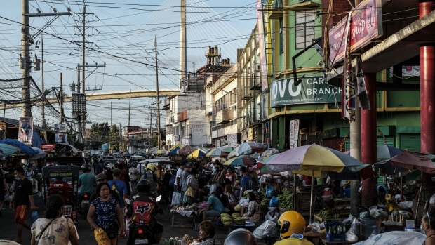 Carbon Market in Cebu City, the Philippines, on Saturday, May 7, 2022. The Philippines peso is in danger of extending this year's decline as uncertainty over the policies of the front-runner in Monday's presidential election adds to economic headwinds. Photographer: Veejay Villafranca/Bloomberg
