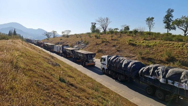 Trucks heading for Mozambique are backed up on the N4 highway outside Mbombela in South Africa on July 6 after protesters blocked parts of the road.