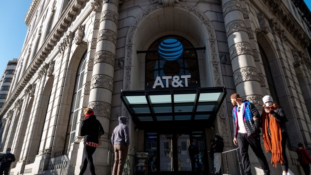 AT&T Inc. signage is displayed on a store in San Francisco, California, U.S., on Tuesday, July 21, 2020. AT&T is expected to release earnings figures on July 23.