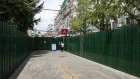A fenced residential neighborhood due to Covid-19 in Shanghai, on July 6. Photographer: Qilai Shen/Bloomberg