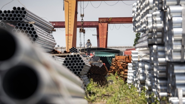 Bundles of steel tubes at a metal stock yard in Shanghai, China, on Thursday, June 16, 2022. Chinese aluminum output hit an all-time high last month, while steel production rose to its strongest in a year, as industrial activity rebounded from the worst of the virus restrictions imposed in April.