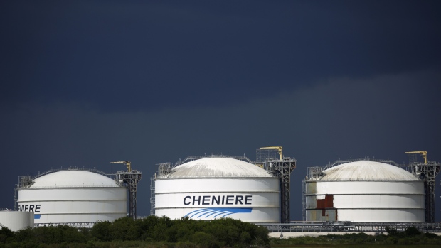 Storage tanks stand the Sabine Pass LNG Export Terminal ahead of Hurricane Laura in Sabine Pass, Texas, U.S., on Tuesday, Aug. 25, 2020. Hurricane Laura is poised to become a roof-ripping Category 3 storm when it comes ashore along the Texas-Louisiana coast, threatening to inflict as much as $12 billion of damage on the region and potentially shutting 12% of U.S. refining capacity for months. Photographer: Luke Sharrett/Bloomberg