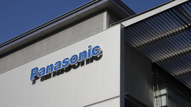The Panasonic Corp. logo is displayed atop the Panasonic Center Tokyo showroom in Tokyo, Japan, on Tuesday, Nov. 22, 2016. Panasonic recently unveiled the device — essentially a smartphone paired with a handheld loudspeaker — betting that police, event organizers and transport staff seeking to control crowds will be eager to get their hands on something that lets them bark orders to a large group of people at once. Photographer: Tomohiro Ohsumi/Bloomberg