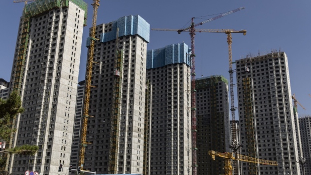 Apartment blocks under construction in the Nanchuan area of Xining. Photographer: Qilai Shen/Bloomberg