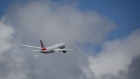 An American Airlines plane takes off from Miami International Airport (MIA) in Miami, Florida, U.S., on Wednesday, March 23, 2022. On Wednesday, American Airlines' pilots picketed as contract negotiations stretched into their third year, according to the Allied Pilots Association (APA).
