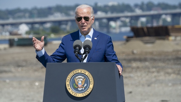 US President Joe Biden speaks at the former Brayton Point Power Station in Somerset, Massachusetts, US, on Wednesday, July 20, 2022. Biden announced executive action to confront climate change, including plans to steer federal dollars to heat-ravaged communities, though he's holding off for now on an emergency decree that would allow him to marshal sweeping powers against global warming.