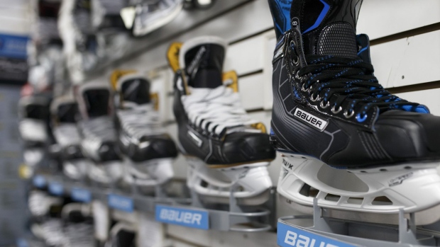 Bauer hockey skates are displayed for sale at an equipment store in Toronto, Ontario, Canada, on Monday, Oct. 31, 2016. Performance Sports Group Ltd., the owner of the Bauer and Easton brands, filed for bankruptcy protection as part of a deal to sell the hockey- and baseball-equipment business for at least $575 million. Photographer: Cole Burston/Bloomberg