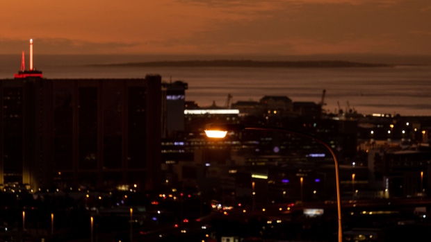 Commercial buildings on the city skyline at dusk in central Cape Town, South Africa, on Thursday, April 21, 2022. South Africa’s state power utility Eskom Holdings SOC Ltd. warned the country may have more than 100 days of electricity blackouts this year because of outages at its power plants. Photographer: Dwayne Senior/Bloomberg