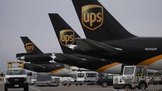 UPS logos on the tails of cargo jets parked at the UPS Worldport facility in Louisville, Kentucky, U.S., on Monday, Jan. 24, 2022. United Parcel Service Inc. is scheduled to release earnings figures on February 1.