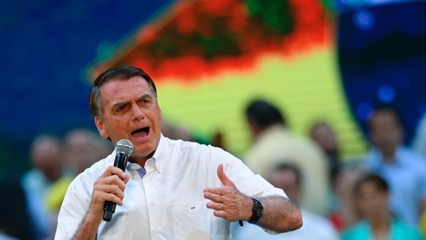 Jair Bolsonaro, Brazil's president, speaks during the National Convention to formalize his candidacy for a second term, at Maracanazinho Gymnasium in Rio de Janeiro, Brazil, on Sunday, July 24, 2022. Bolsonaro officially kicked off his re-election campaign on Sunday, rallying thousands of his followers to Rio de Janeiro, after intensifying his attempts to discredit Brazil's voting system.