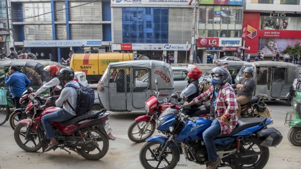 Vehicles sit in traffic in Dhaka, Bangladesh, on Tuesday, Dec. 10, 2019. Bangladesh estimated 8.15% GDP growth for the year that ended June 30. Photographer: Ismail Ferdous/Bloomberg