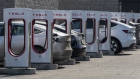 Tesla vehicles at charging stations at a dealership in Rocklin, California, U.S., on Friday, Jan. 21, 2022. Tesla Inc. is scheduled to release earnings figures on January 26.