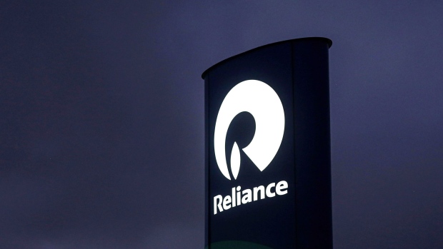 Reliance Industries Ltd. signage at a gas station near the company's oil refinery in Jamnagar, Gujarat, India. Photographer: Dhiraj Singh/Bloomberg