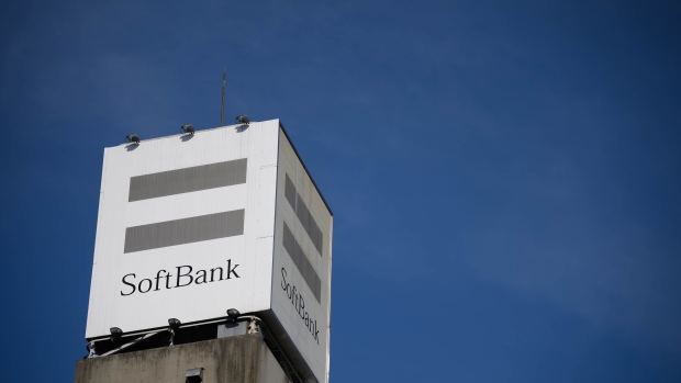 Signage displayed atop a SoftBank Corp. store in Tokyo, Japan, on Tuesday, May 10, 2022. SoftBank Group Corp. is scheduled to release its full-year results on May 12. Photographer: Akio Kon/Bloomberg