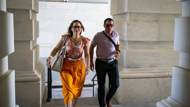 Senator Kyrsten Sinema, a Democrat from Arizona, arrives for a vote at the US Capitol in Washington, D.C., US, on Thursday, Aug. 4, 2022. Sinema is seeking to preserve a tax break for investment managers and narrow a levy hike on large corporations in the economic package Democrats want to pass as soon as this week.