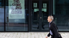 Residents pass boarded-up closed businesses in Weston-super-Mare, U.K., on Tuesday, April 12, 2022. U.K. inflation surged to 7% last month, a fresh three-decade high that worsens a cost of living crisis threatening to derail the nation’s economic recovery.