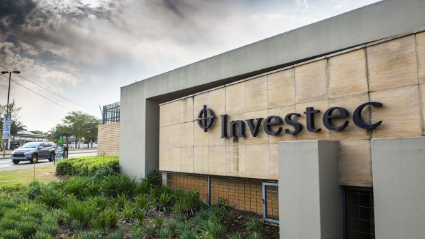 A logo sits on display outside an Investec Plc bank offices in Pretoria, South Africa, on Wednesday, Sept. 23, 2020. South Africa’s biggest lenders were faced with the pressing need to raise provisions to protect against souring loans, while demand for credit slumped as the coronavirus lockdown took a toll on business customers. Photographer: Waldo Swiegers/Bloomberg