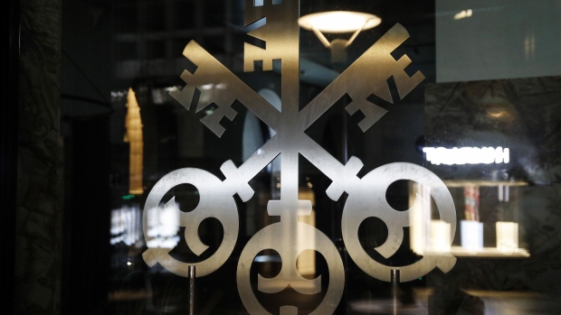 The crossed keys symbol, the logo of UBS Group AG, outside the company's headquarters in Zurich, Switzerland, on Tuesday, Jan. 26, 2021. UBS plans to buy back as much as 4 billion francs ($4.5 billion) of shares over the next three years, bolstering shareholder returns after income from managing client assets and investment banking propelled gains at the world’s largest wealth manager.
