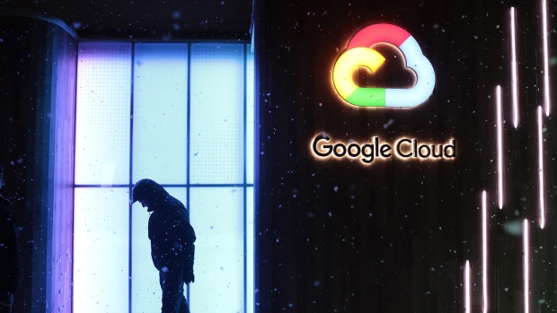 A worker stands by a Google Inc. 'Google Cloud' pop-up space in Davos. Photographer: Jason Alden/Bloomberg