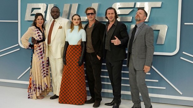 Kelly McCormick, Brian Tyree Henry, Joey King, Brad Pitt, Aaron Taylor-Johnson, and David Leitch at the UK Gala Screening of the film "Bullet Train" in London. Photographer: Niklas Halle'n/AFP/Getty Images