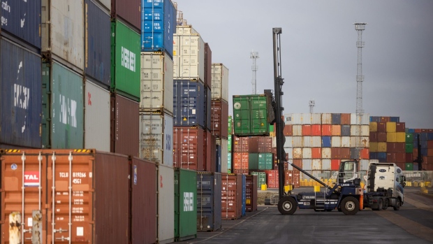 Shipping containers on the dockside at the Port of Felixstowe Ltd. in Felixstowe, U.K., on Thursday, Jan. 20, 2022. The Danish carrier AP Moller-Maersk A/S has been overtaken by Mediterranean Shipping Co. in terms of capacity, according to data compiled by Alphaliner