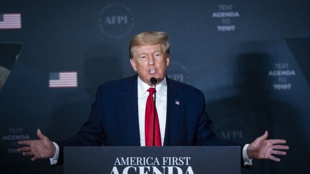 Former US President Donald Trump speaks during the America First Policy Institute's America First Agenda Summit in Washington, D.C., US, on Tuesday, July 26, 2022. Trumps remarks come on the heels of a House hearing that portrayed him standing by indifferently, even vindictively, for hours as a mob of his supporters battled police and chased lawmakers through the halls of the Capitol.