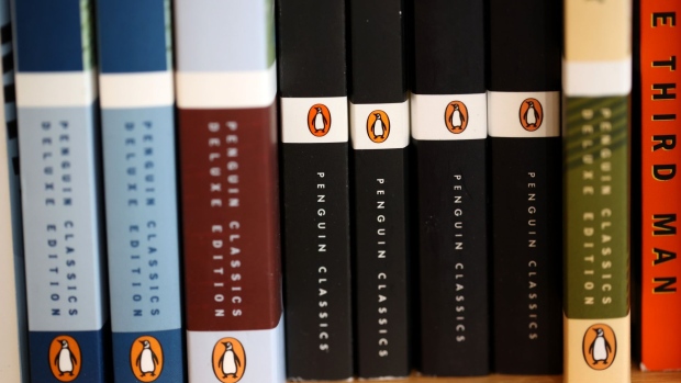 CORTE MADERA, CALIFORNIA - NOVEMBER 02: The Penguin logo is visible on the spines of books displayed on a shelf at Book Passage on November 02, 2021 in Corte Madera, California. The U.S. Department of Justice is suing Penguin Random House and Simon & Schuster to block the companies from completing a merger valued at $2.175 billion. (Photo by Justin Sullivan/Getty Images)