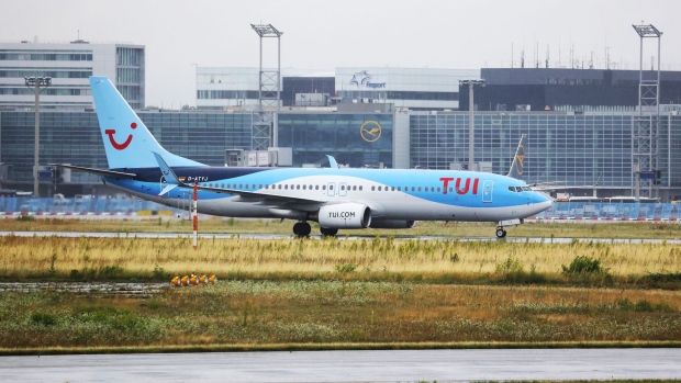 A Boeing Co. 737-800 passenger aircraft, operated by TUI AG, taxis at Frankfurt Airport in Frankfurt, Germany, on Tuesday, July 6, 2021. TUI has raised billions of euros from three bailouts since the coronavirus pandemic punctured its business ferrying north Europeans to warm-weather destinations in the Mediterranean and beyond.