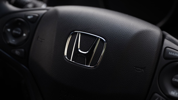 The Honda Motor Co. badge is displayed on the steering wheel of a vehicle at the company's showroom in Tokyo, Japan, on Tuesday, Aug. 1, 2017. Honda is scheduled to report first-quarter earnings figures today.